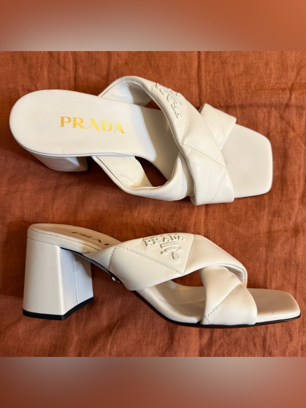 Prada | White Quilted Leather Crisscross Block Heel Mules
